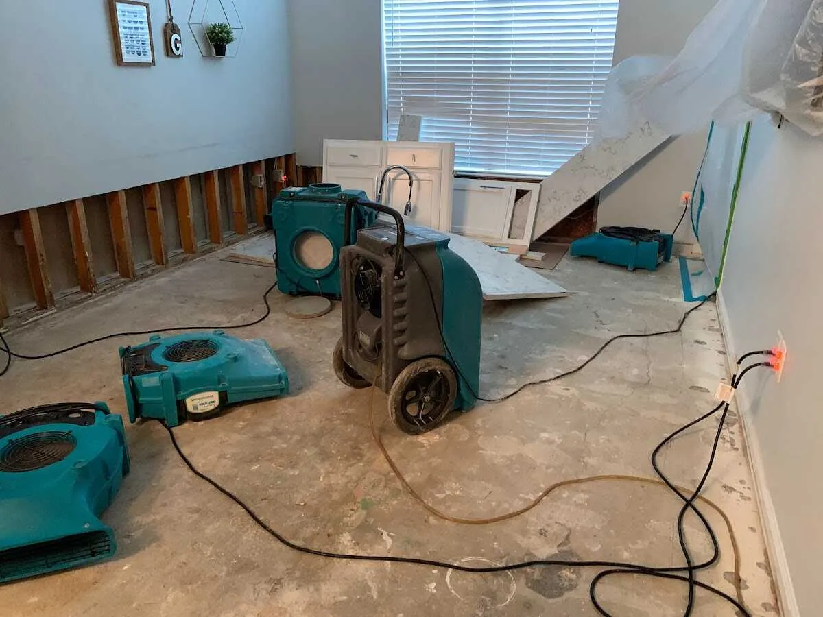 Dehumidifier in flood-cut room for Water Damage Restoration in Grandville