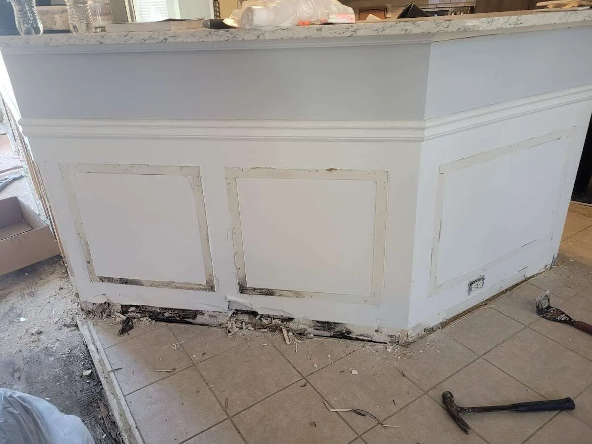 Water damage and mold on kitchen during Storm Damage Restoration in Grandville